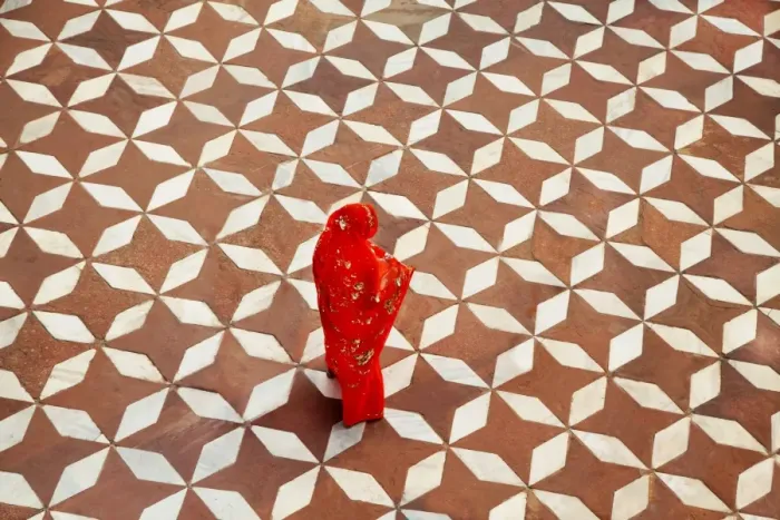 Framed Print : Woman standing on designed flooring Framed Print : Woman standing on designed flooring