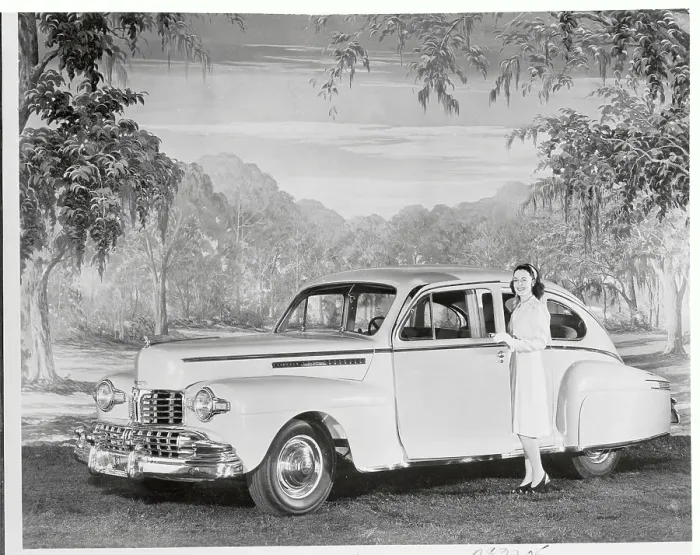 Framed Print : Woman Standing by New Lincoln Automobile Framed Print : Woman Standing by New Lincoln Automobile