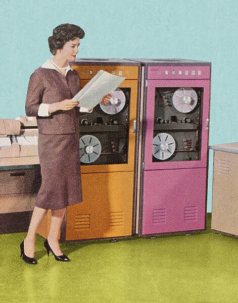 Woman Standing at Old Computers