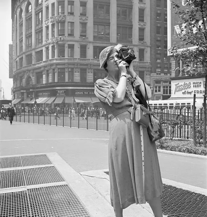 Framed Print : Woman Standing on Street Photographing Framed Print : Woman Standing on Street Photographing