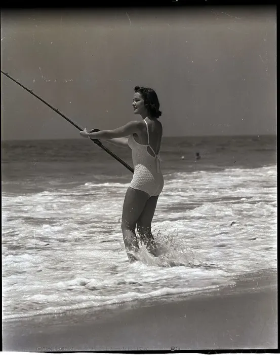 Framed Print : Woman Standing in Surf to Fish Framed Print : Woman Standing in Surf to Fish