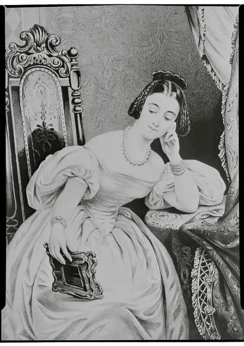 Framed Print : Woman Staring at Photograph Framed Print : Woman Staring at Photograph