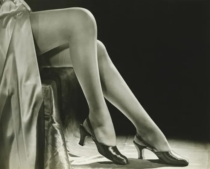 Framed Print : Woman in stockings sitting on chair, close-up of legs, (B&W), low section Framed Print : Woman in stockings sitting on chair, close-up of legs, (B&W), low section