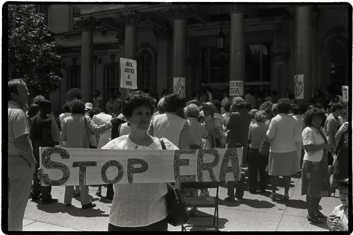 Framed Print : Woman with Stop ERA Sign at NOW Rally Framed Print : Woman with Stop ERA Sign at NOW Rally