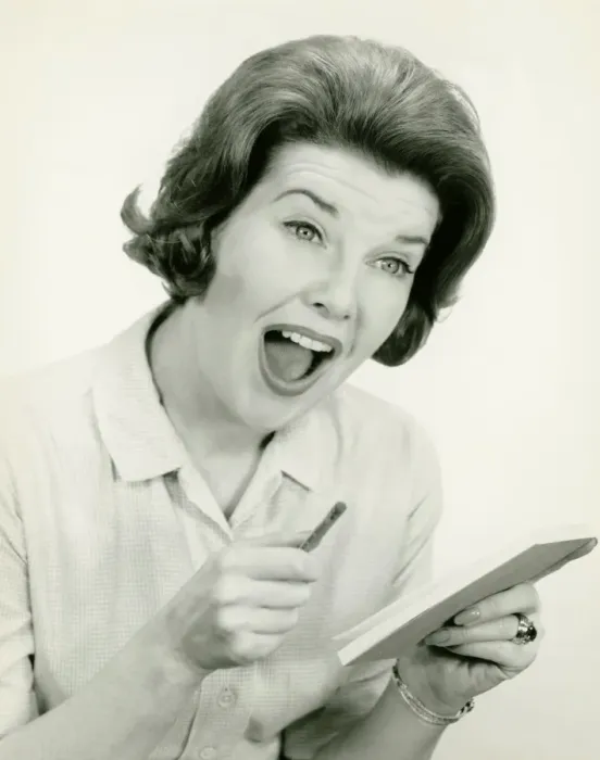Framed Print : Woman in striped blouse with surprised facial expression, posing in studio, (B&W), (Portrait) Framed Print : Woman in striped blouse with surprised facial expression, posing in studio, (B&W), (Portrait)