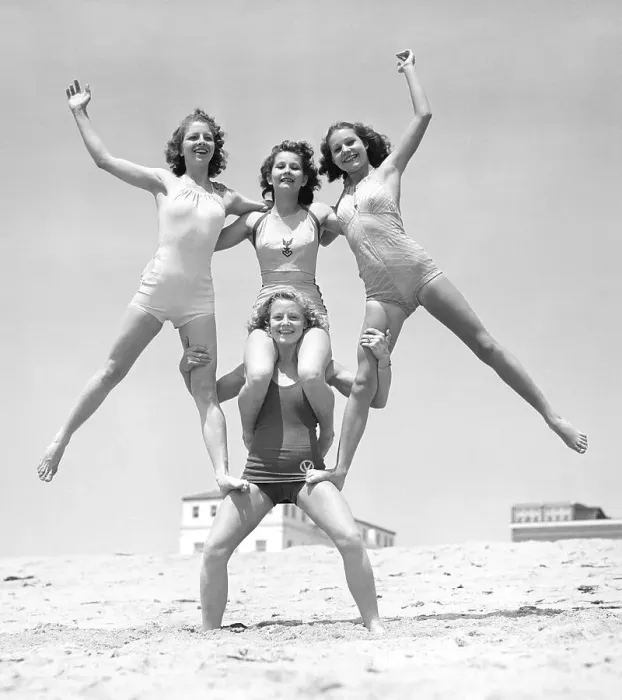 Framed Print : Woman Supporting Three Balancing Girls Framed Print : Woman Supporting Three Balancing Girls