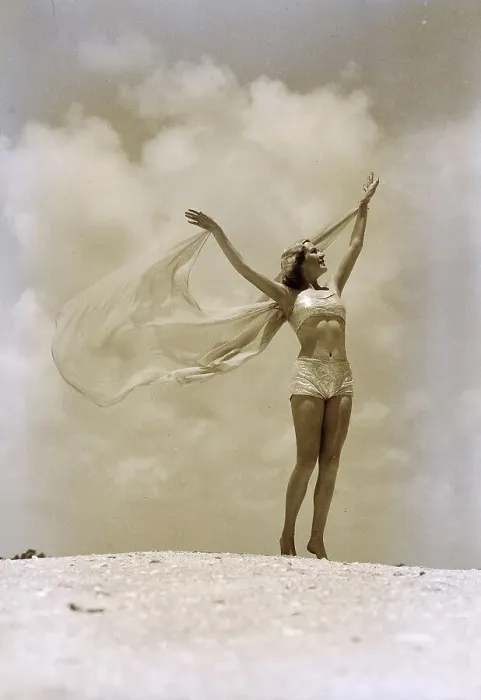 Framed Print : Woman in Swimsuit with Arms Outstretched Framed Print : Woman in Swimsuit with Arms Outstretched