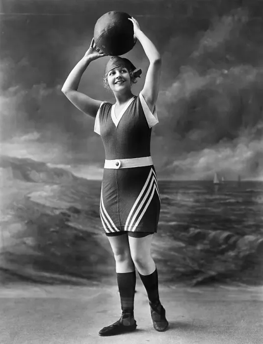 Framed Print : Woman in Swimsuit Holding Ball Framed Print : Woman in Swimsuit Holding Ball