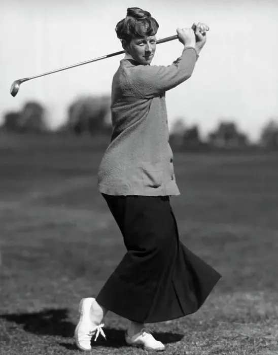 Framed Print : Woman Swinging a Golf Club