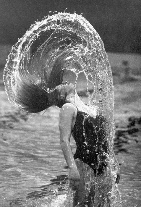 Framed Print : Woman Swinging Her Hair In Swimming Pool Framed Print : Woman Swinging Her Hair In Swimming Pool