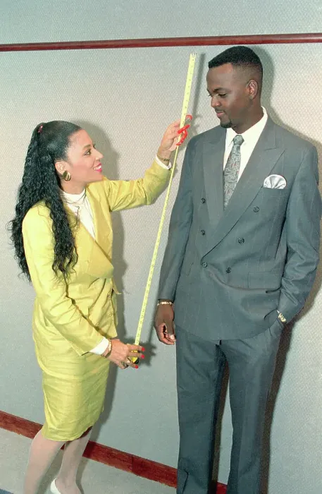 Framed Print : Woman Taking Measurements of George McCloud Framed Print : Woman Taking Measurements of George McCloud