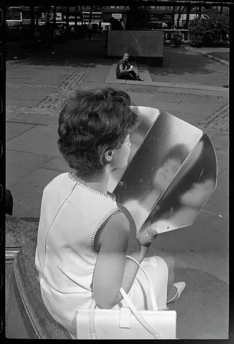 Framed Print : Woman Tanning with Reflective Panel Framed Print : Woman Tanning with Reflective Panel