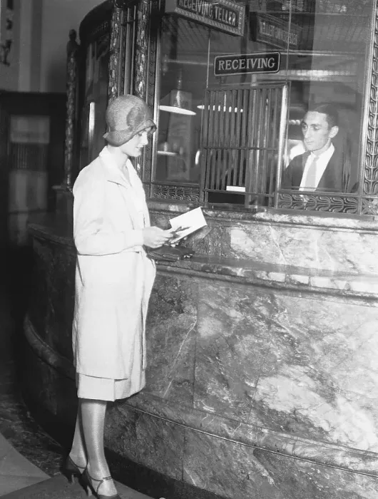 Framed Print : Woman at Teller's Cage in Bank Framed Print : Woman at Teller's Cage in Bank