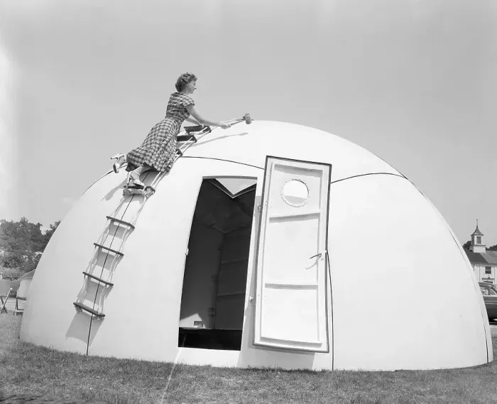 Framed Print : Woman Testing Portable Shelter Framed Print : Woman Testing Portable Shelter