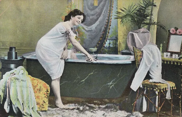 Framed Print : Woman Testing Water Temperature in Bathtub