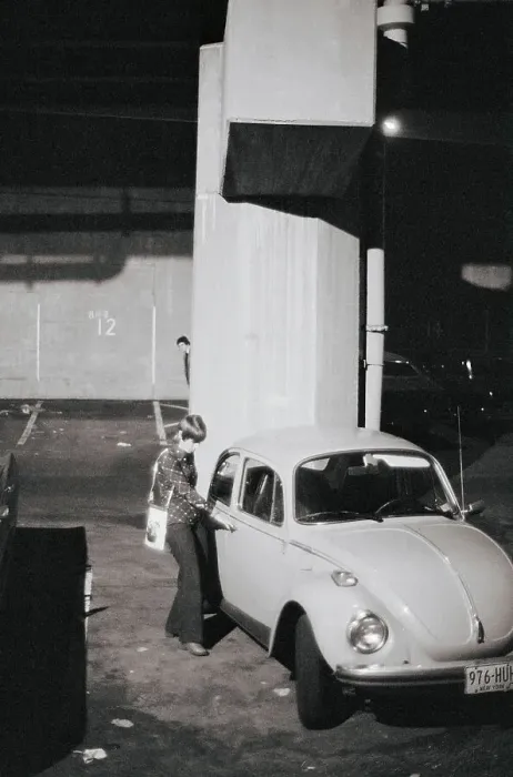 Framed Print : Woman Trying to Open a Car Door Framed Print : Woman Trying to Open a Car Door