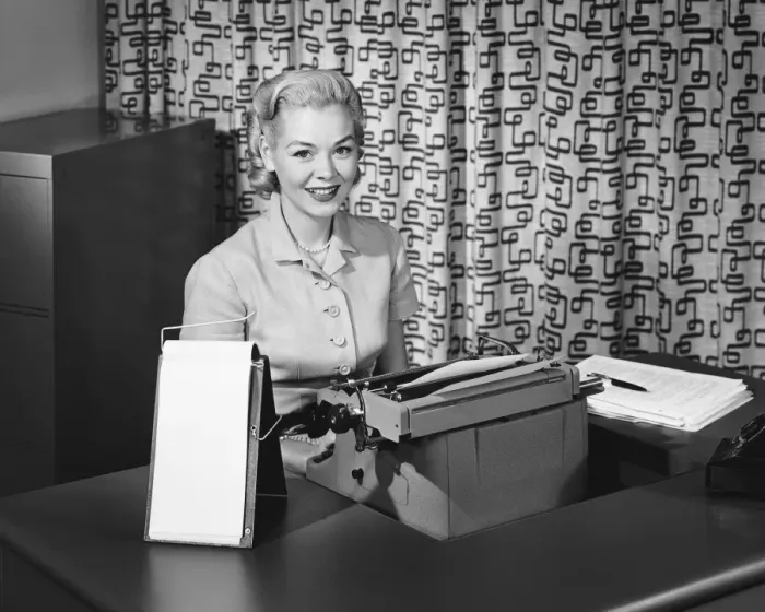 Framed Print : Woman typing, smiling and posing
