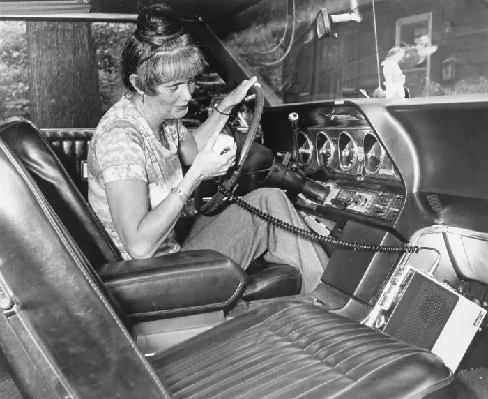 Framed Print : Woman Using CB Radio in Her Car Framed Print : Woman Using CB Radio in Her Car