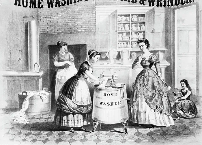 Framed Print : Woman Using Home Washing Machine Framed Print : Woman Using Home Washing Machine