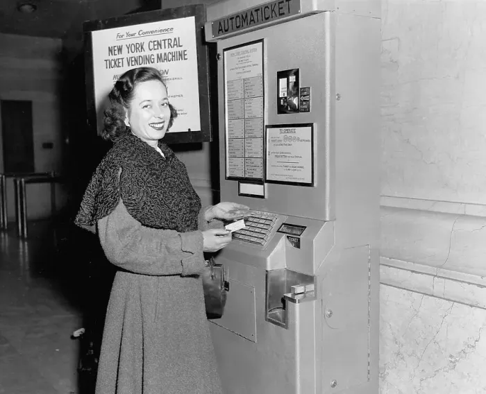 Framed Print : Woman Using New Subway Ticket Machine in Grand Central Terminal
