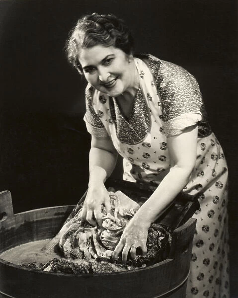 Woman using wash board