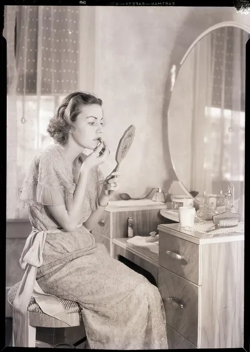 Framed Print : Woman at Vanity Applying Lipstick Framed Print : Woman at Vanity Applying Lipstick