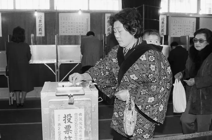 Framed Print : Woman Voting in Tokyo Framed Print : Woman Voting in Tokyo