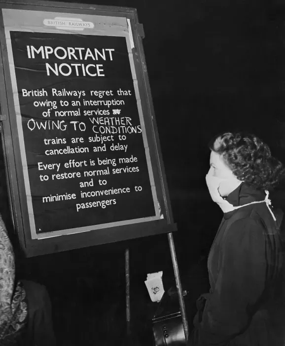 Framed Print : Woman W / Gas Mask Reads Sign; Rr Delays Framed Print : Woman W / Gas Mask Reads Sign; Rr Delays