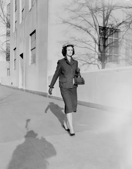 Framed Print : Woman walking down street Framed Print : Woman walking down street