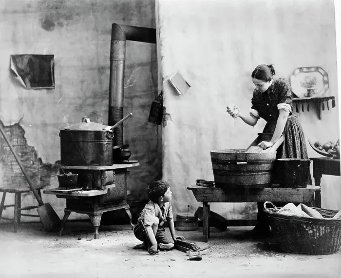 Framed Print : Woman Washing; Boy On Floor; Kitchen Framed Print : Woman Washing; Boy On Floor; Kitchen