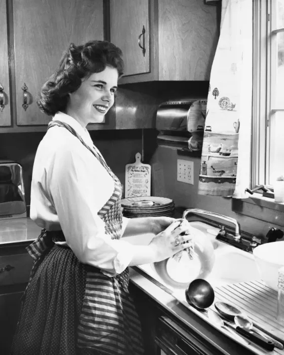 Framed Print : Woman washing dishes in kitchen Framed Print : Woman washing dishes in kitchen
