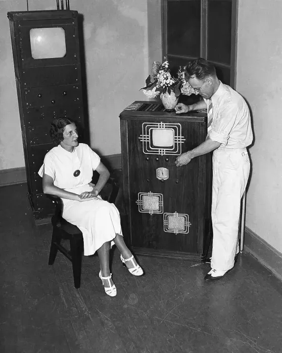 Framed Print : Woman Watches Inventor Demonstrate TV Framed Print : Woman Watches Inventor Demonstrate TV