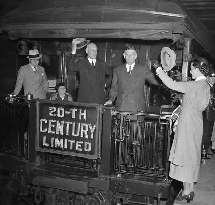 Framed Print : Woman Waving Goodbye to Train Passengers Framed Print : Woman Waving Goodbye to Train Passengers