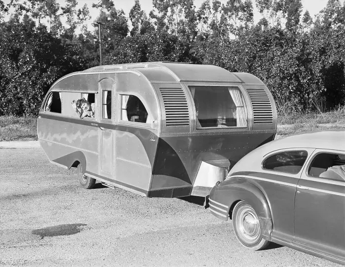 Framed Print : Woman Waving from Trailer Window Framed Print : Woman Waving from Trailer Window