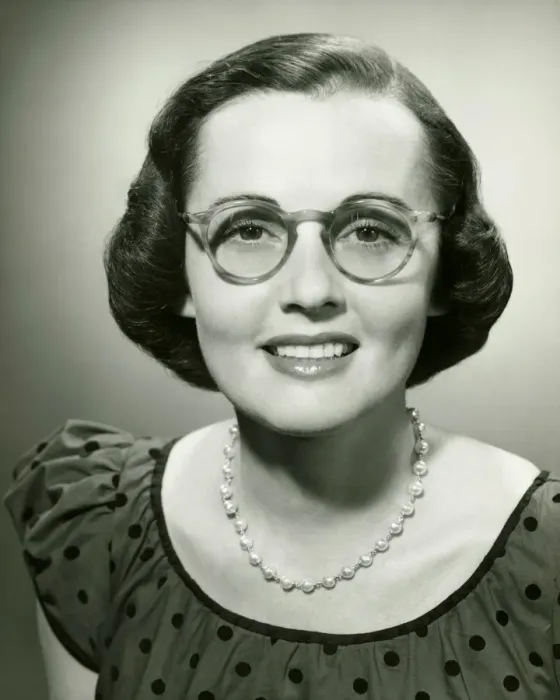 Framed Print : Woman wearing glasses posing in studio, (B&W), (Close-up), (Portrait) Framed Print : Woman wearing glasses posing in studio, (B&W), (Close-up), (Portrait)