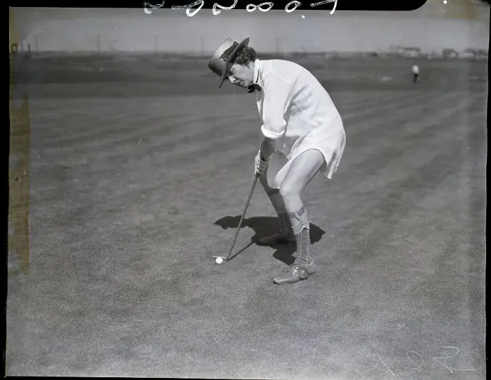 Framed Print : Woman Wearing No Pants While Playing Golf