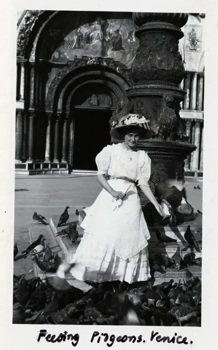 Framed Print : Woman in White Dress Feeding Pigeons Framed Print : Woman in White Dress Feeding Pigeons