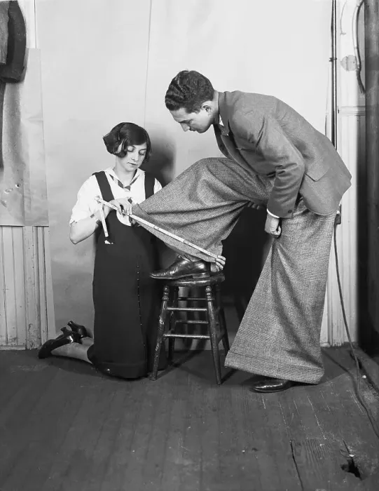 Framed Print : Woman Has Wide-Cuffs Of Trousers Measure Framed Print : Woman Has Wide-Cuffs Of Trousers Measure