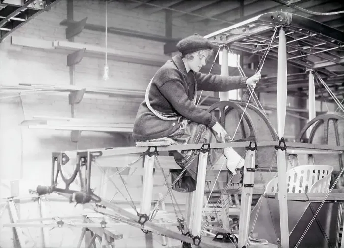 Framed Print : Woman Working on Airplane Framed Print : Woman Working on Airplane