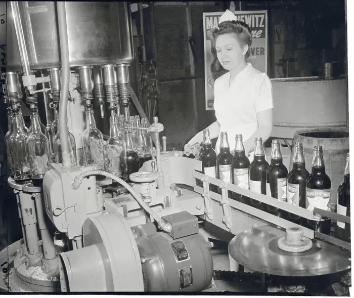 Framed Print : Woman Working at Bottling Factory Framed Print : Woman Working at Bottling Factory