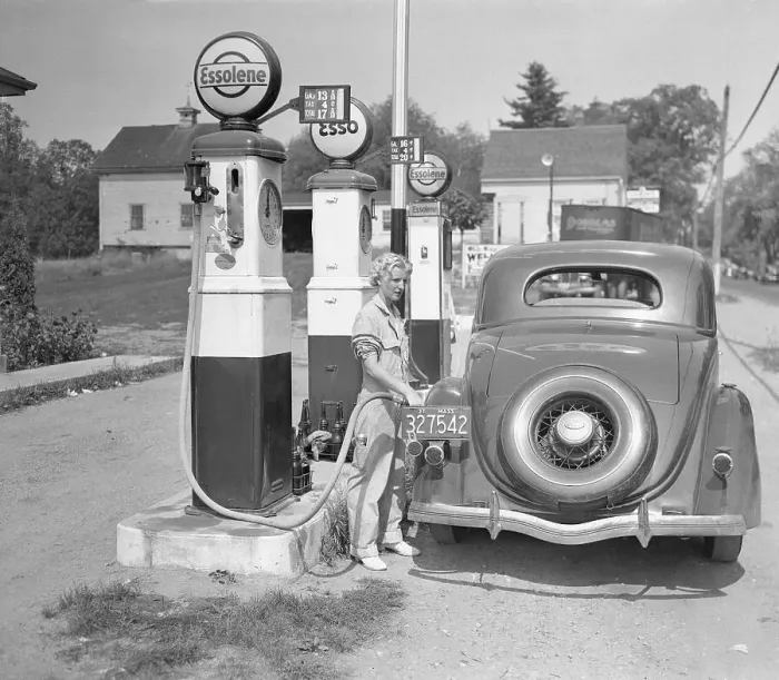 Framed Print : Woman Working at Gas Station Framed Print : Woman Working at Gas Station