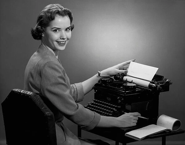 Woman working at typewriter