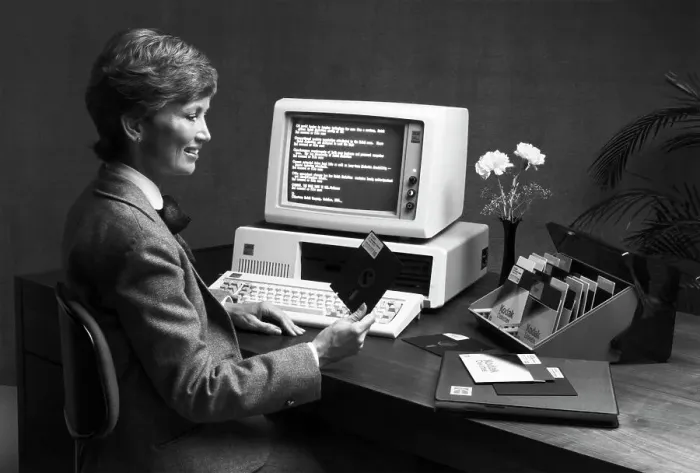 Framed Print : Woman Works with Computer & 5 1 / 4 Diskette Framed Print : Woman Works with Computer & 5 1 / 4 Diskette