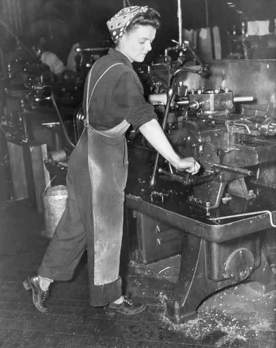 Framed Print : Woman Works Turret Lathe in Machine Shop