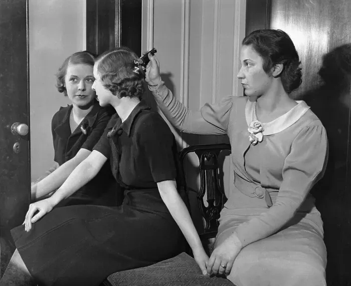 Framed Print : Woman Writing on Friend's Hair Framed Print : Woman Writing on Friend's Hair