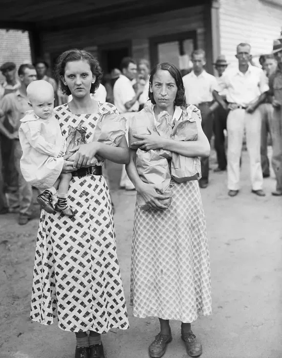 Framed Print : Two Women with Bags and Baby on Strike Framed Print : Two Women with Bags and Baby on Strike