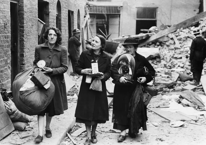 Framed Print : Women with Belongings in Bombed Area Framed Print : Women with Belongings in Bombed Area