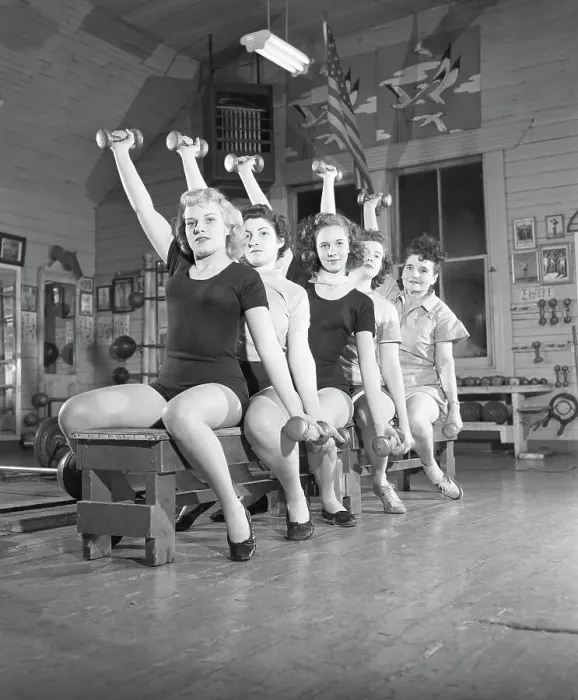 Framed Print : Women On Bench Exercising With Barbells Framed Print : Women On Bench Exercising With Barbells