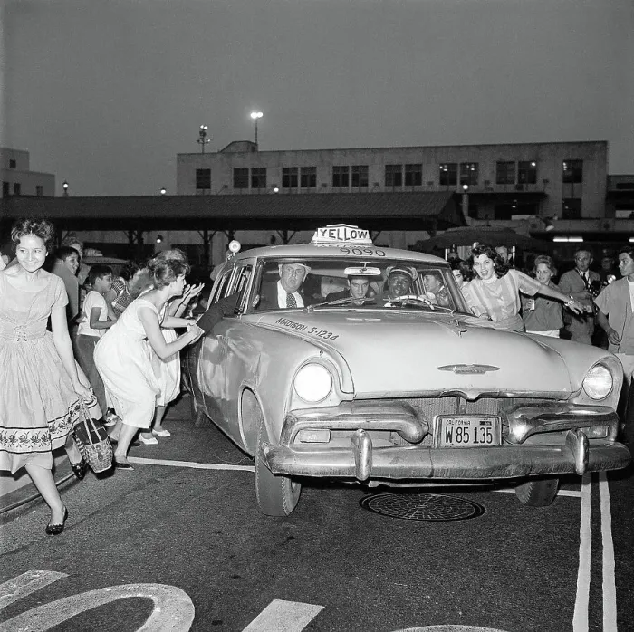 Framed Print : Women Chasing Elvis Presley's Taxi Framed Print : Women Chasing Elvis Presley's Taxi