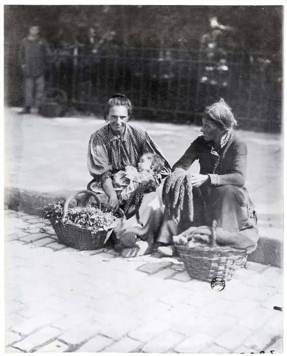 Framed Print : Two Women And Child Sitting On Curb Framed Print : Two Women And Child Sitting On Curb